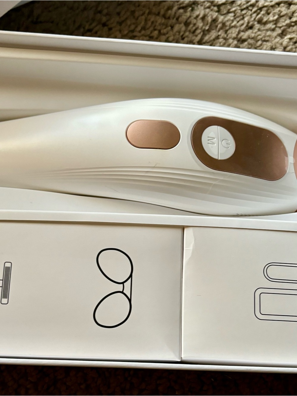 White & Rose Gold Handheld Beauty Device